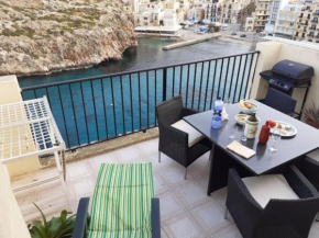 Seafront Penthouse with Terrace in Xlendi, Gozo